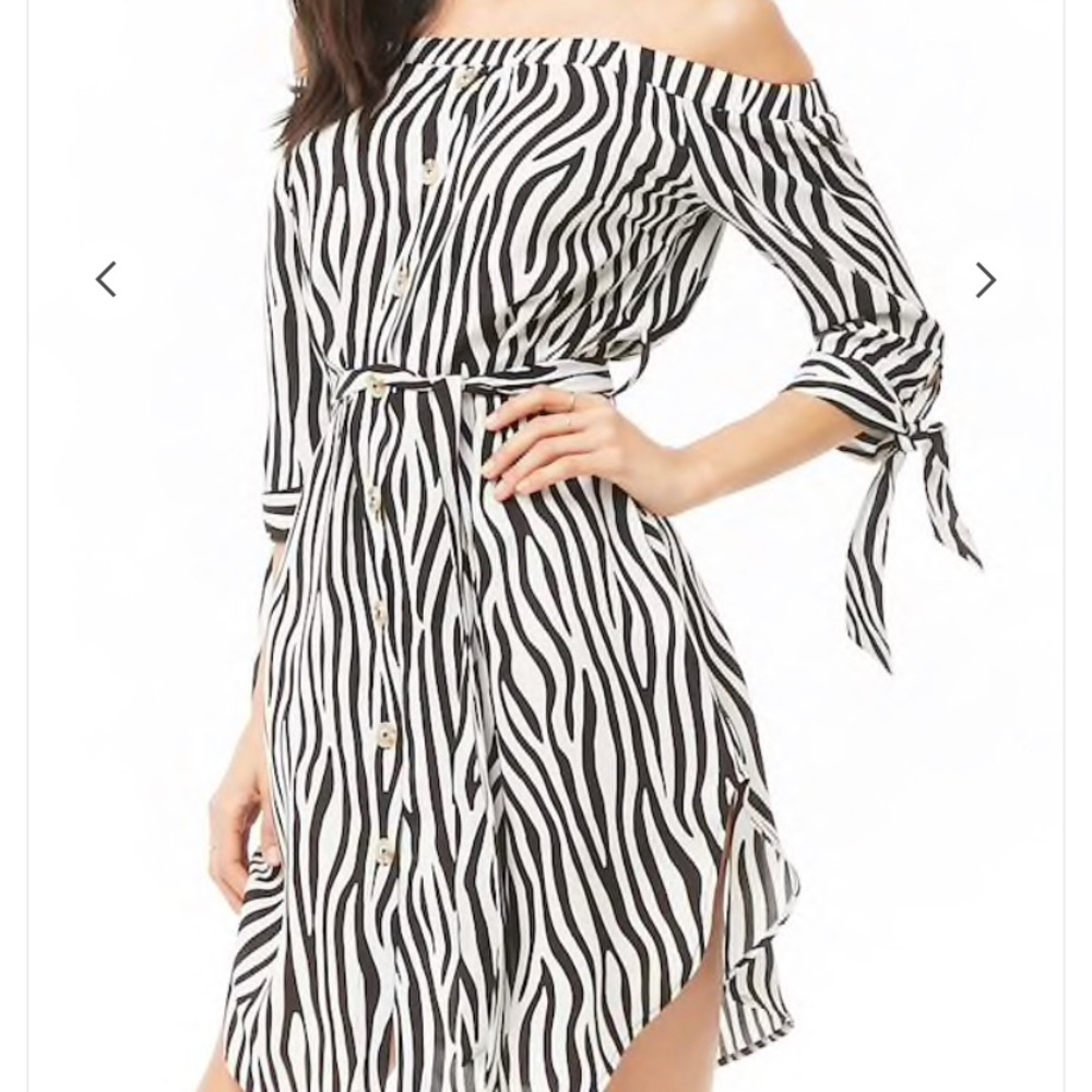 Off-the-shoulder tiger striped dress.